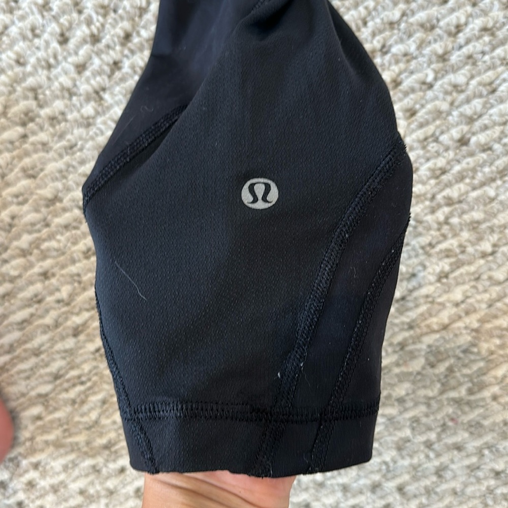 Black LuluLemon Cropped Leggings with back zippered pocket! Lightly worn